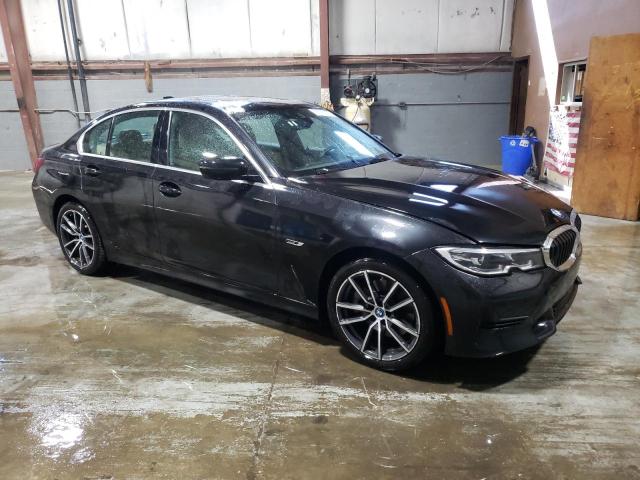 3MW5P9J05N8C72204 - 2022 BMW 330XE BLACK photo 4