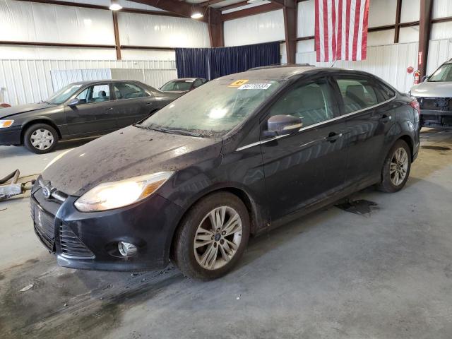 1FAHP3H27CL454048 - 2012 FORD FOCUS SEL BLACK photo 1