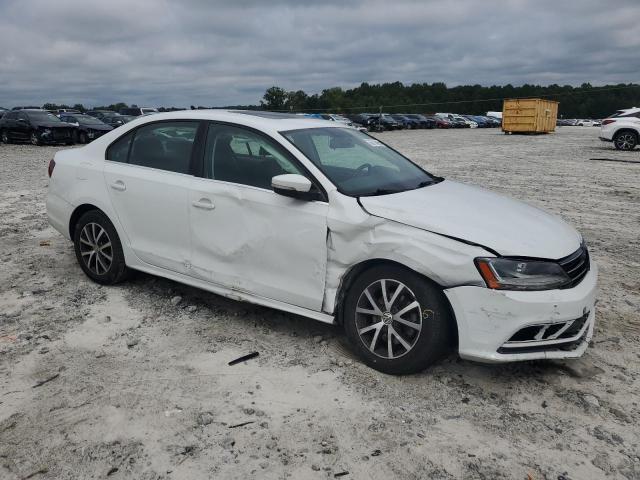 3VWDB7AJ0HM414591 - 2017 VOLKSWAGEN JETTA SE WHITE photo 4