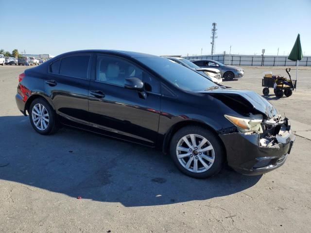 19XFB2F9XCE306723 - 2012 HONDA CIVIC EXL BLACK photo 4