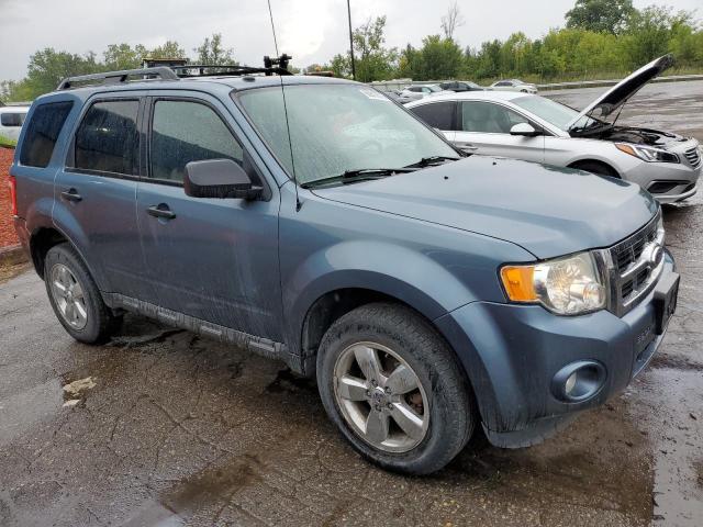 1FMCU0D78BKB12704 - 2011 FORD ESCAPE XLT BLUE photo 4