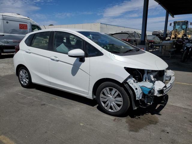 JHMGK5H56GX002485 - 2016 HONDA FIT LX WHITE photo 4