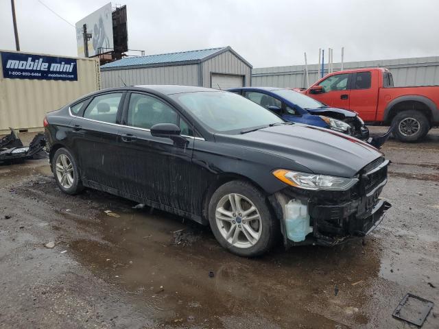 3FA6P0H7XJR174012 - 2018 FORD FUSION SE BLACK photo 4