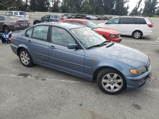 WBAAZ33454KP86332 - 2004 BMW 325 IS SULEV BLUE photo 4