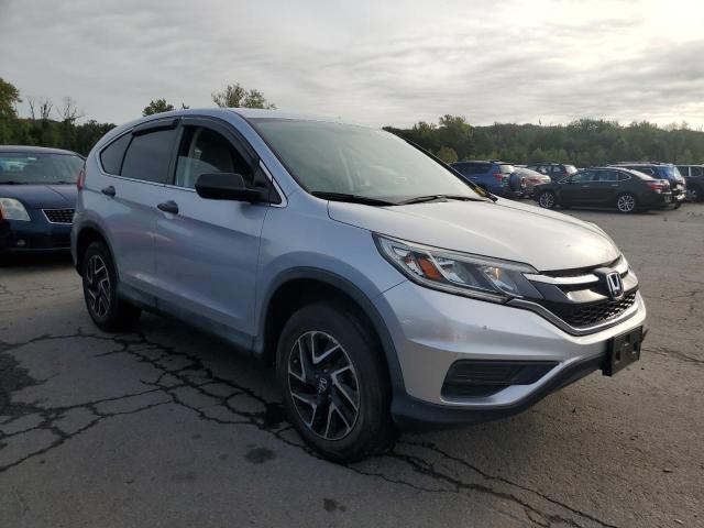 2HKRM4H46GH697875 - 2016 HONDA CR-V SE SILVER photo 4