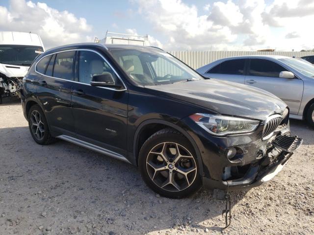 WBXHT3Z3XH4A55011 - 2017 BMW X1 XDRIVE28I BLACK photo 4