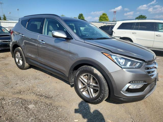 5NMZU3LB8JH097542 - 2018 HYUNDAI SANTA FE S GRAY photo 4
