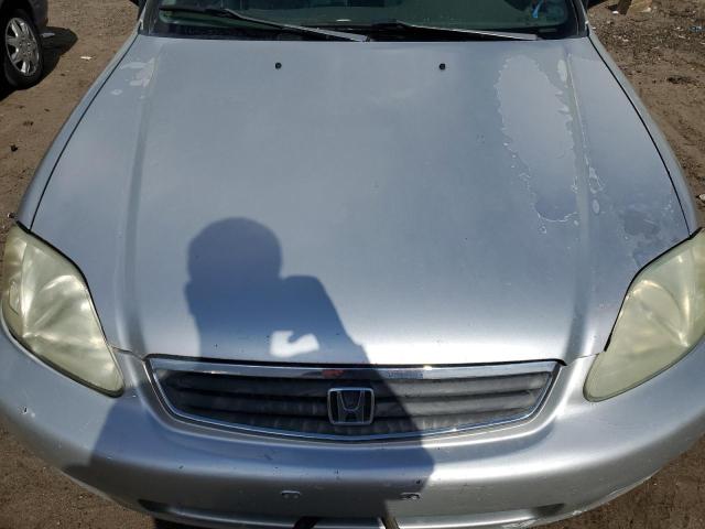 2HGEJ6619YH509499 - 2000 HONDA CIVIC BASE SILVER photo 11