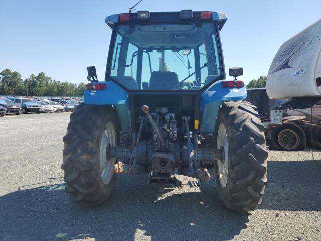 042572BEA5PVW - 2014 NEWH TRACTOR BLUE photo 6