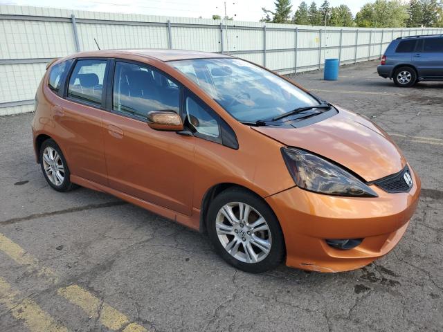 JHMGE8H6XAS024527 - 2010 HONDA FIT SPORT ORANGE photo 4