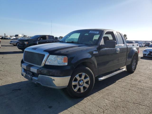 1FTPX02555KB99576 - 2005 FORD F150 BLACK photo 1