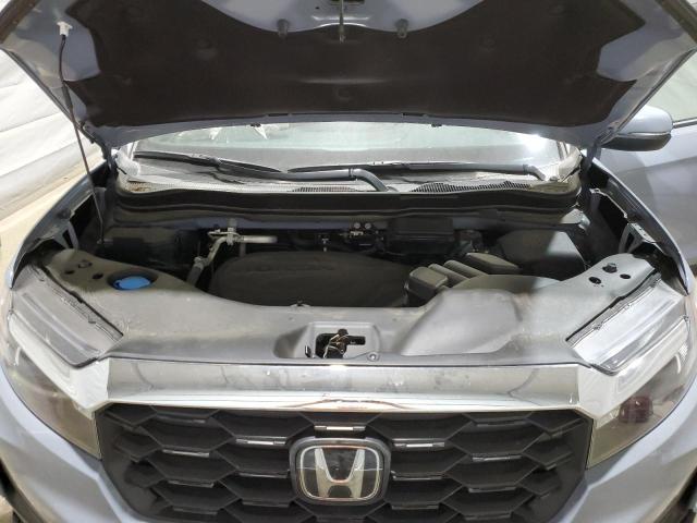 5FNYF8H56PB031149 - 2023 HONDA PASSPORT EXL Blau Foto 12