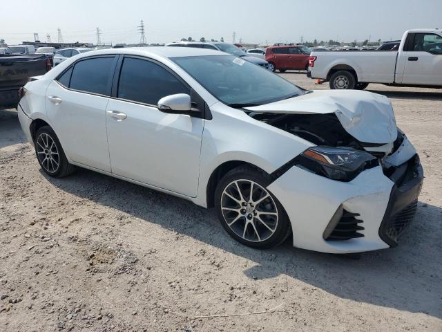 5YFBURHE4HP611670 - 2017 TOYOTA COROLLA L WHITE photo 4