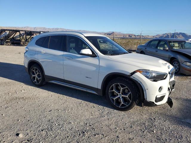 WBXHT3C38GP880287 - 2016 BMW X1 XDRIVE28I WHITE photo 4