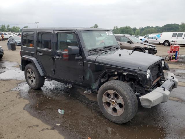 1C4BJWEG6GL323380 - 2016 JEEP WRANGLER U SAHARA BLACK photo 4