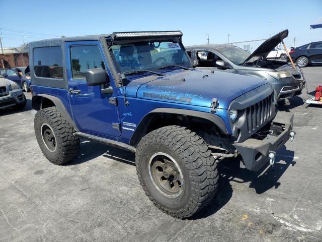 1J4AA2D11AL182639 - 2010 JEEP WRANGLER SPORT BLUE photo 4