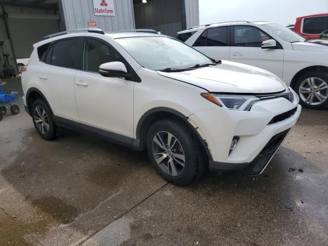 JTMWFREV0HD102825 - 2017 TOYOTA RAV4 XLE WHITE photo 4