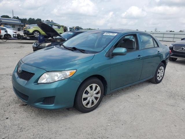 1NXBU4EE8AZ221540 - 2010 TOYOTA COROLLA BASE TEAL photo 1