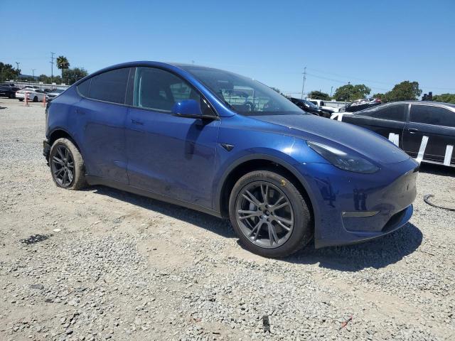 7SAYGDEE5SF219134 - 2025 TESLA MODEL Y ლურჯი ფოტო 4