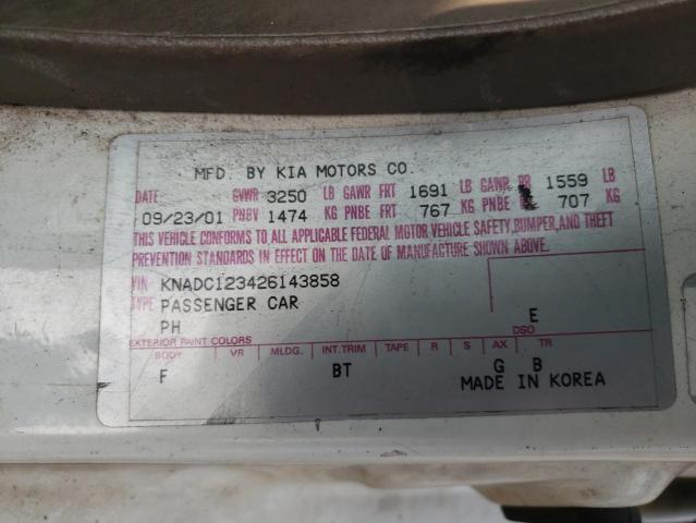 KNADC123426143858 - 2002 KIA RIO WHITE photo 12