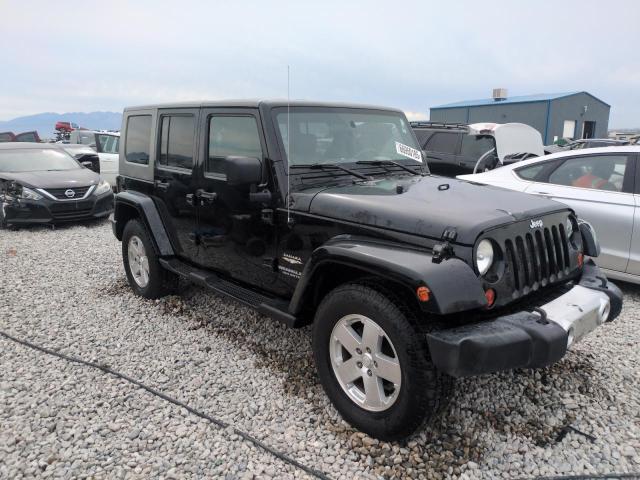 1J4GA59118L651999 - 2008 JEEP WRANGLER U SAHARA BLACK photo 4