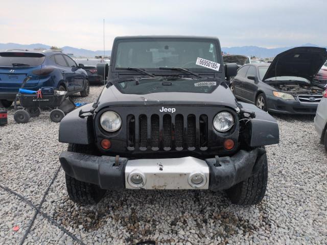 1J4GA59118L651999 - 2008 JEEP WRANGLER U SAHARA BLACK photo 5