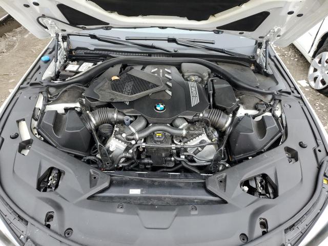 WBAGV8C03NCJ56725 - 2022 BMW M850XI WHITE photo 11