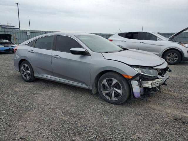 2HGFC2F58KH007357 - 2019 HONDA CIVIC LX SILVER photo 4