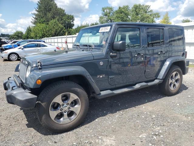 1C4BJWEG0GL231729 - 2016 JEEP WRANGLER U SAHARA GRAY photo 1