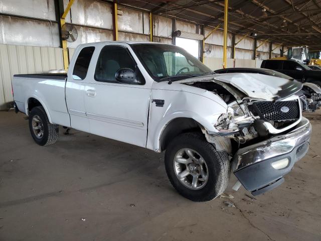 1FTRX18L2YNC04045 - 2000 FORD F150 WHITE photo 4