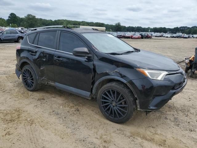 2T3ZFREV1GW310002 - 2016 TOYOTA RAV4 LE BLACK photo 4