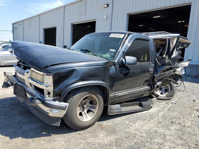 1GDEC16R7XJ734076 - 1999 GMC SUBURBAN C1500 BLACK photo 1