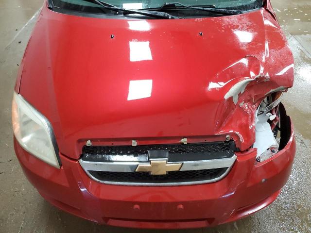 KL1TD5DE1AB105339 - 2010 CHEVROLET AVEO LS RED photo 11