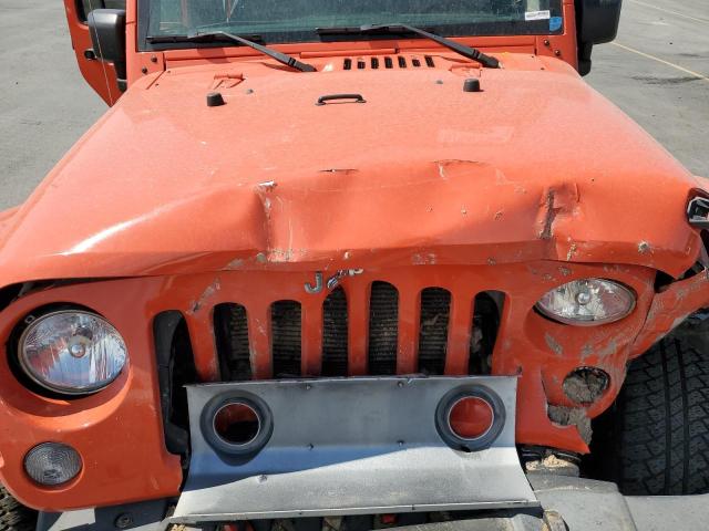 1C4BJWEG7FL593118 - 2015 JEEP WRANGLER U SAHARA ORANGE photo 12