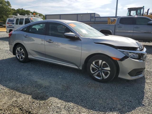 2HGFC2F5XJH586558 - 2018 HONDA CIVIC LX SILVER photo 4