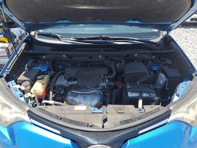 JTMZFREV8JJ734623 - 2018 TOYOTA RAV4 LE Կապույտ լուսանկար 12