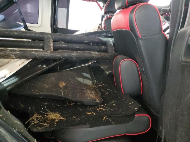 1C4BJWEGXCL279491 - 2012 JEEP WRANGLER U SAHARA BLACK photo 11