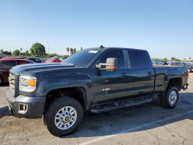 1GT12TEG9JF176632 - 2018 GMC SIERRA K2500 SLT CHARCOAL photo 1