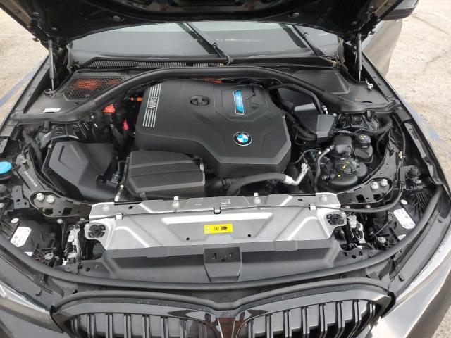 3MW39FS03P8D42106 - 2023 BMW 330XE BLACK photo 11