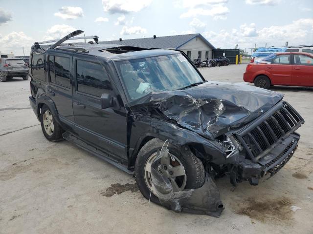 1J8HH48N26C339815 - 2006 JEEP COMMANDER BLACK photo 4