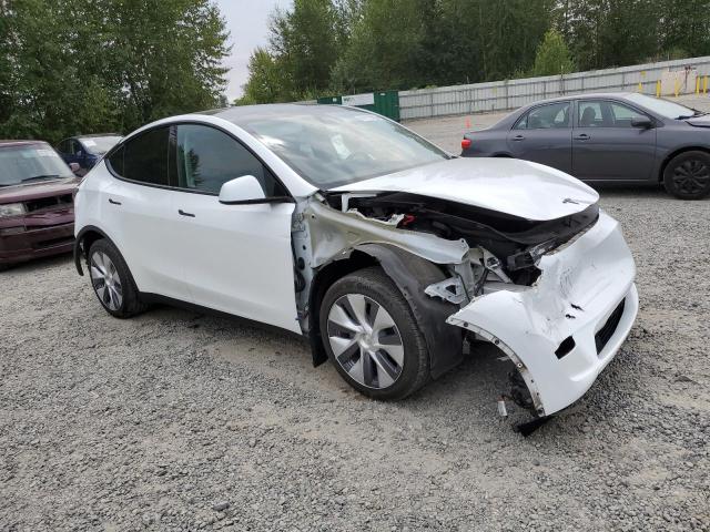 7SAYGDEE9PA144619 - 2023 TESLA MODEL Y Белый фото 4