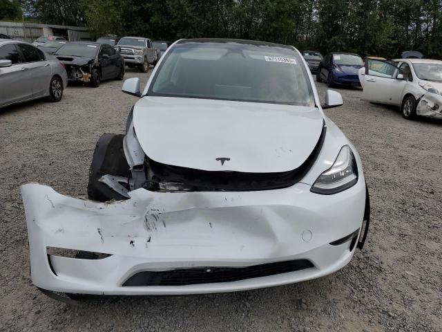 7SAYGDEE9PA144619 - 2023 TESLA MODEL Y Белый фото 5