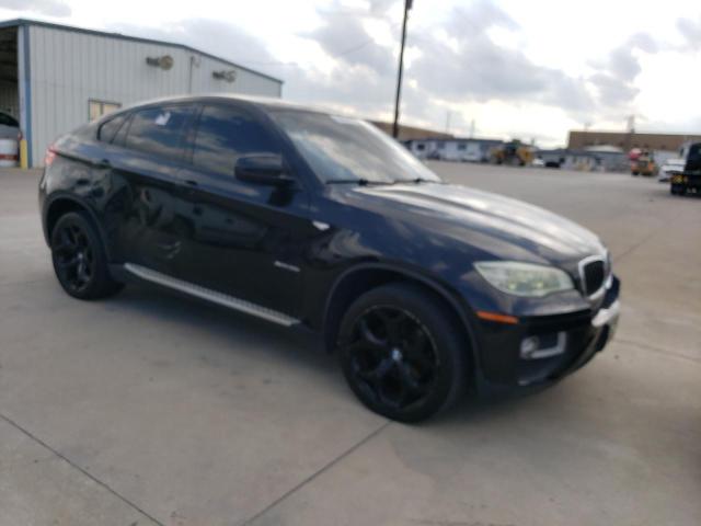 5UXFG2C51E0C44502 - 2014 BMW X6 XDRIVE35I BLACK photo 4