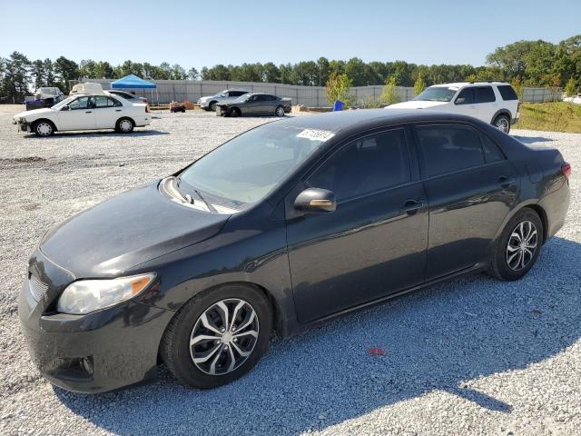 2T1BU4EE0AC486535 - 2010 TOYOTA COROLLA BASE BLACK photo 1