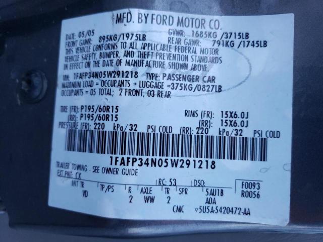 1FAFP34N05W291218 - 2005 FORD FOCUS ZX4 GRAY photo 12