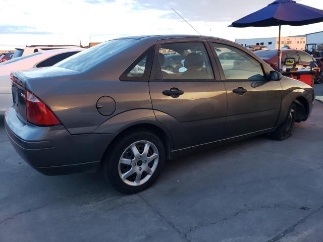 1FAFP34N05W291218 - 2005 FORD FOCUS ZX4 GRAY photo 3