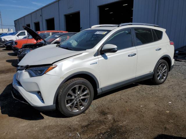 JTMDJREV3JD241276 - 2018 TOYOTA RAV4 HV LIMITED WHITE photo 1