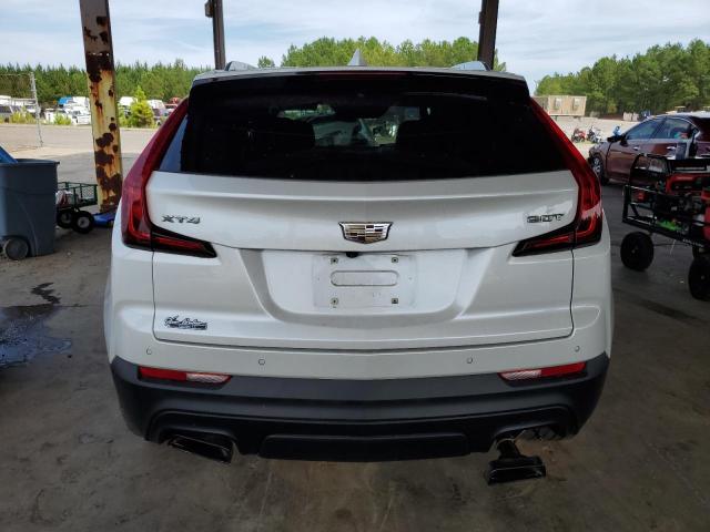 1GYAZAR47KF147626 - 2019 CADILLAC XT4 LUXURY WHITE photo 6