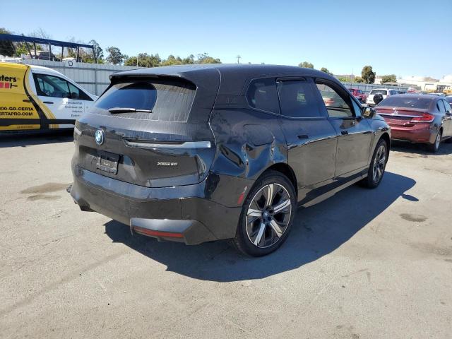 WB523CF0XRCP60436 - 2024 BMW IX XDRIVE50 Qara foto 3