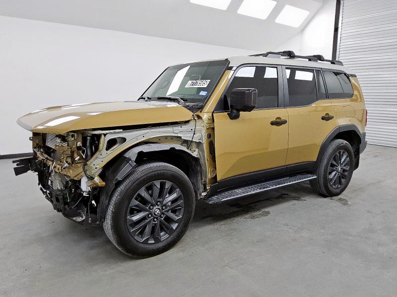 JTEABFAJ8SK025692 - 2025 TOYOTA LAND CRUIS BASE Gold Foto 1